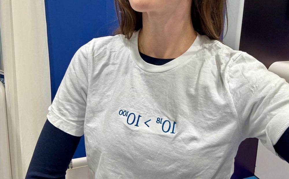 Exa '10^18 > 10^100' NeurIPS tee