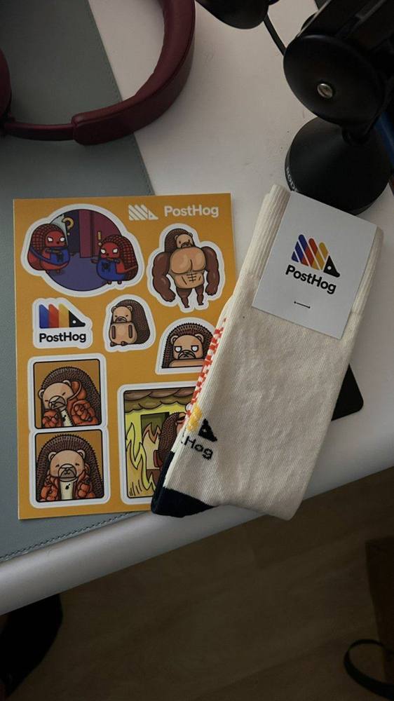 PostHog Sticker sheet + white socks pack