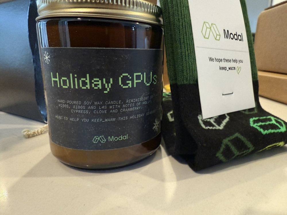 Modal 'Holiday GPUs' candle + GPU socks