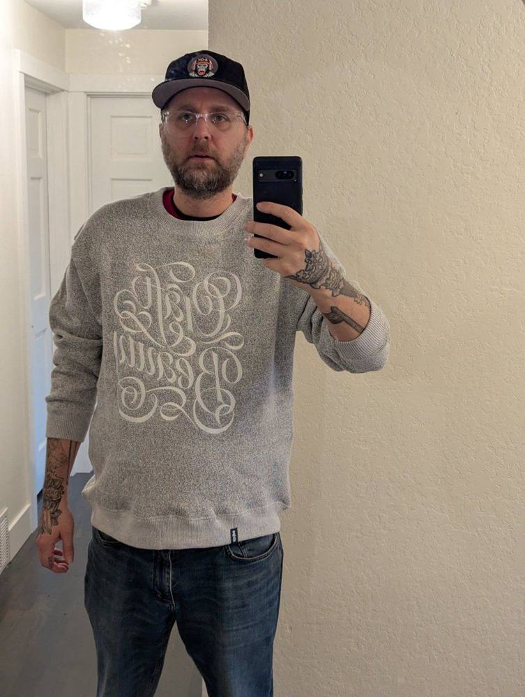 Stripe 'Craft & Beauty' calligraphy sweatshirt